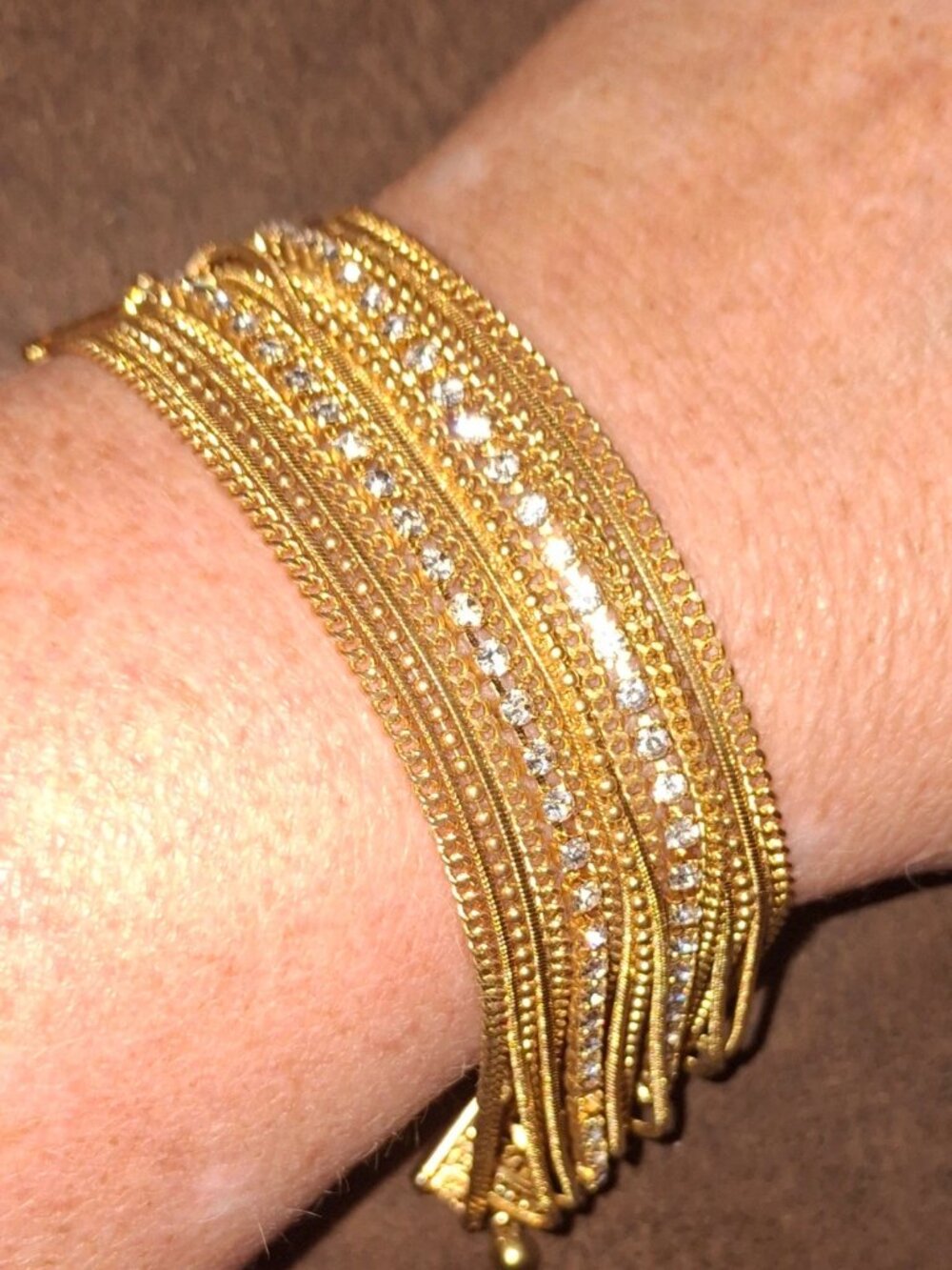 Adjustable goldtone multirow chain and rhinestone bracelet formal